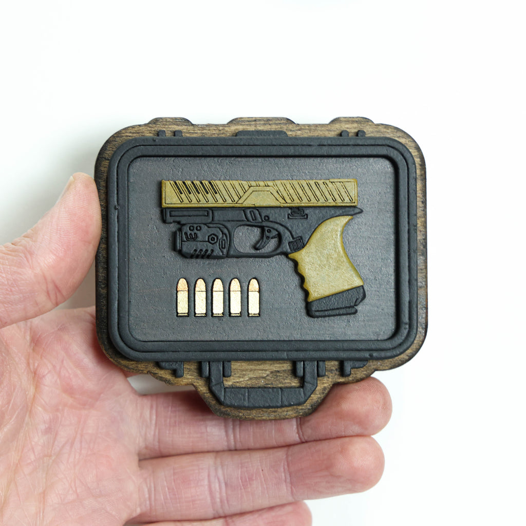 მაცივრის მაგნიტი: Glock-ის ფირმის პისტოლეტი 